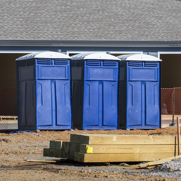 how often are the portable restrooms cleaned and serviced during a rental period in Oliver